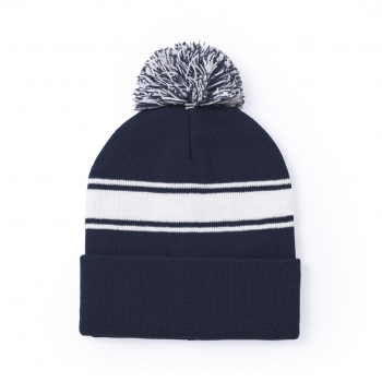 Gorro de acrílico con tira frontal blanca y pom pom bicolor a juego — el diseño más diferenciado del catálogo