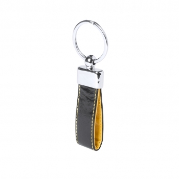 Llavero de polipiel bicolor con accesorio metálico en estuche troquelado individual