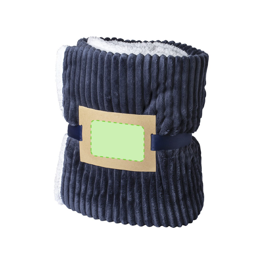 Manta bicolor de coral fleece y sherpa de 440 g/m² — la más cálida y gruesa del catálogo, con lámina de cartón reciclado