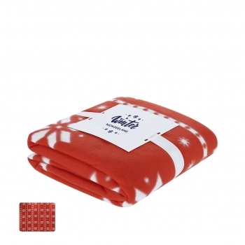 Manta navideña Yalanny RPET 200 g/m² — 130x160 cm roja con motivos en blanco, anti-pilling, distintivo RPET, presentada en cartón blanco con lazo
