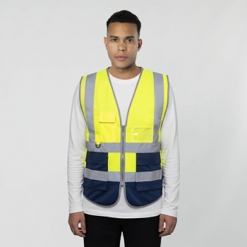 Chaleco reflectante Ledger adulto homologado — alta visibilidad bicolor, 4 bandas reflectantes, múltiples bolsillos con compartimento para tarjeta identificativa